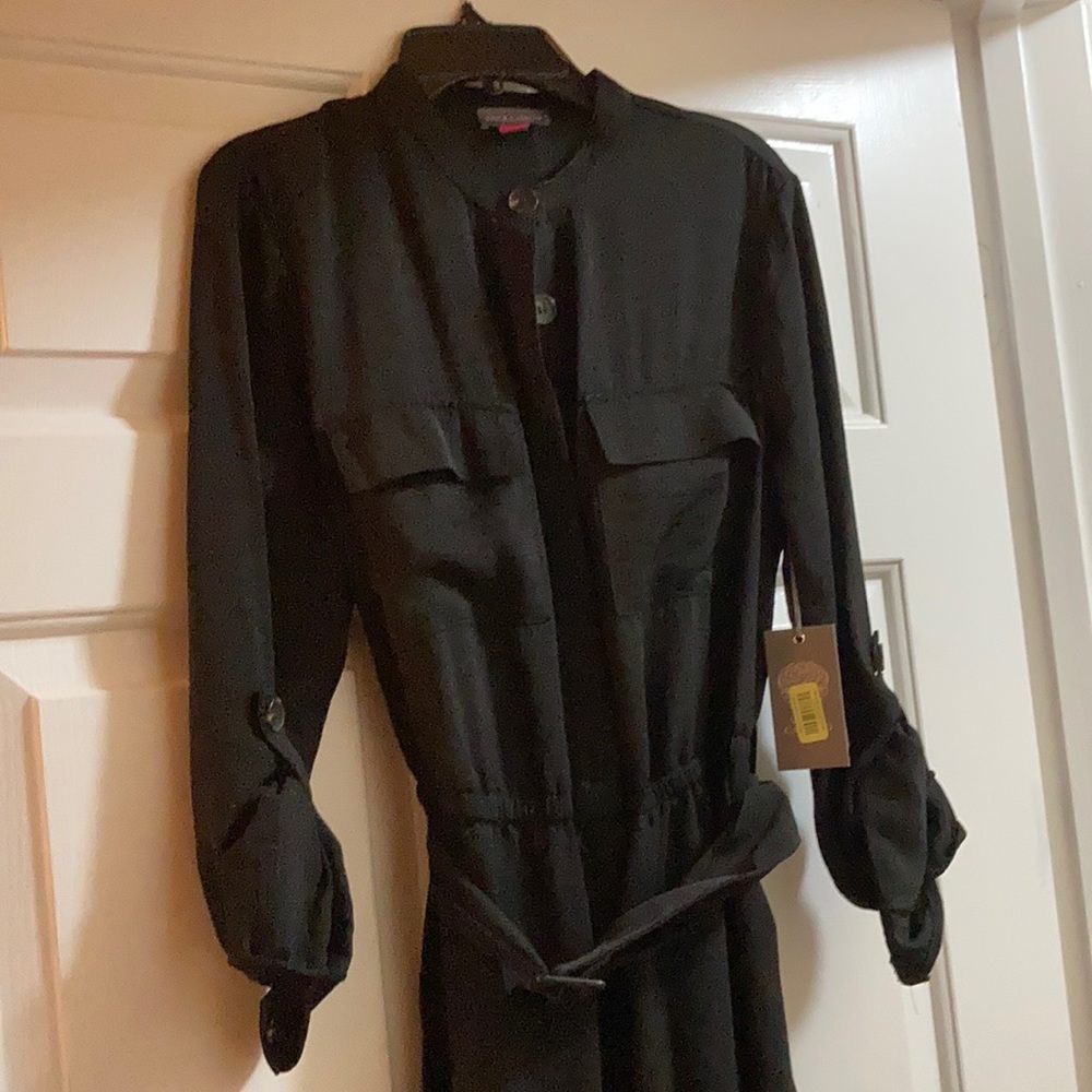 It’s a Vince Camuto jumpsuit, size 2 and black!